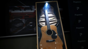 Oasis guitars among music memorabilia worth £3 mn at UK auction