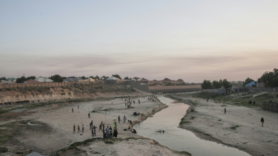 Home in Nigeria, ex-refugees find themselves in a war zone