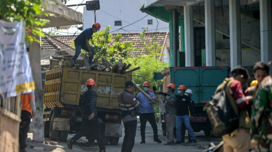 Rescuers say no more signs of life in rubble of collapsed Indonesian school