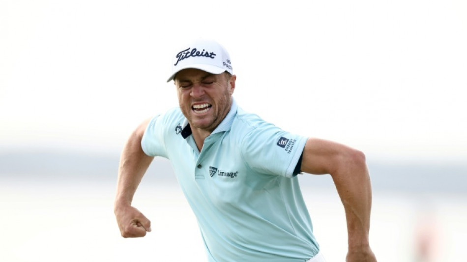 Thomas ends long wait with playoff win over Novak