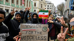 Iran protest toll mounts as government stages mass rallies 