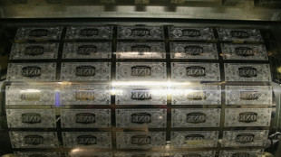 Stock markets fluctuate after Fed rate cut