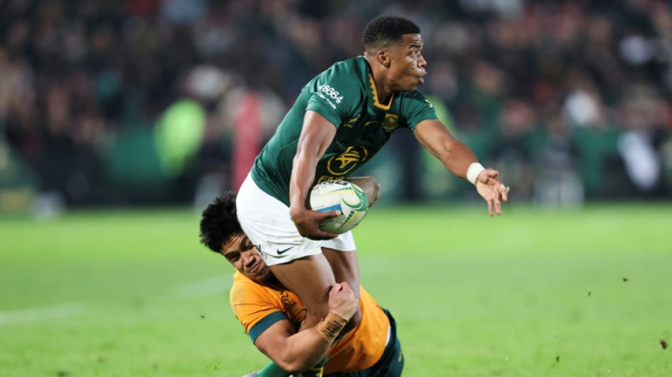 Australia coach Schmidt hails 'great bunch of young men'