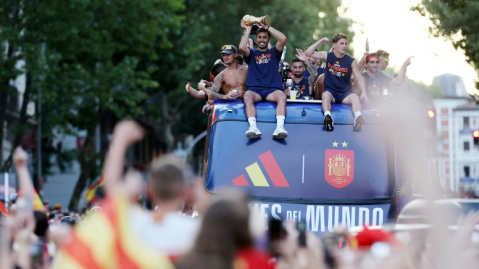 Spain stars lap up adulation of estimated two million on World Cup parade