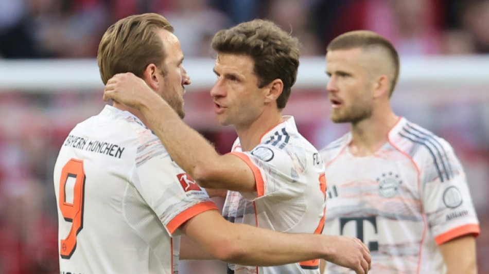 Kane tastes first title as champions Bayern see off Mueller