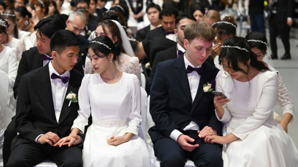 'Happiness, love' at Moonie mass wedding after Japanese court blow