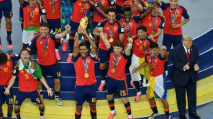Trump lingers on stage to lap up World Cup spotlight