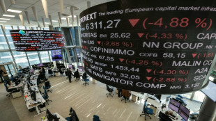 La Bourse de Paris finit dans le vert, entre Fed et Ukraine