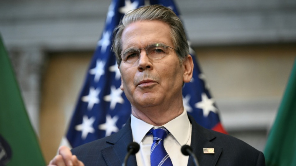 Markets mixed as traders weigh China-US row, rate cut hopes