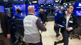 Trump vows huge new China tariffs as markets nosedive