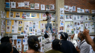 Nepal's wall of missing offers last hope after Himalayan flood