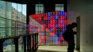 Asian markets drop with Wall St as tech fears revive