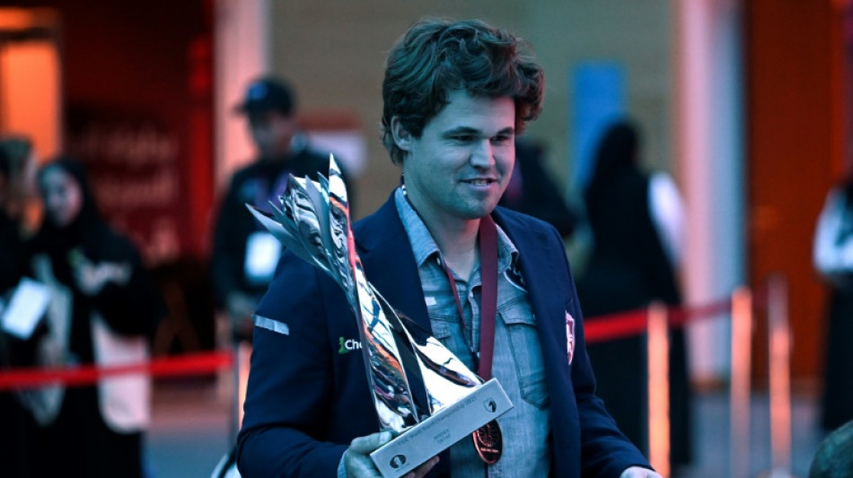 Norway's Magnus Carlsen wins 20th world chess title