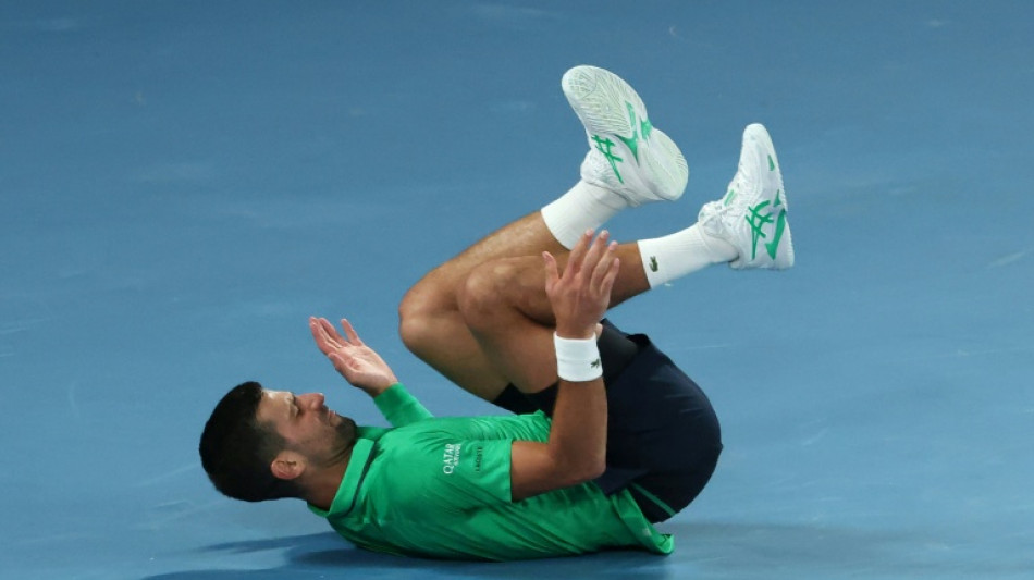 Djokovic wins record 400th Slam match to power on in Australia
