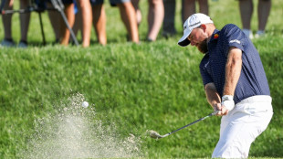 Lowry, Straka share lead at windy Truist